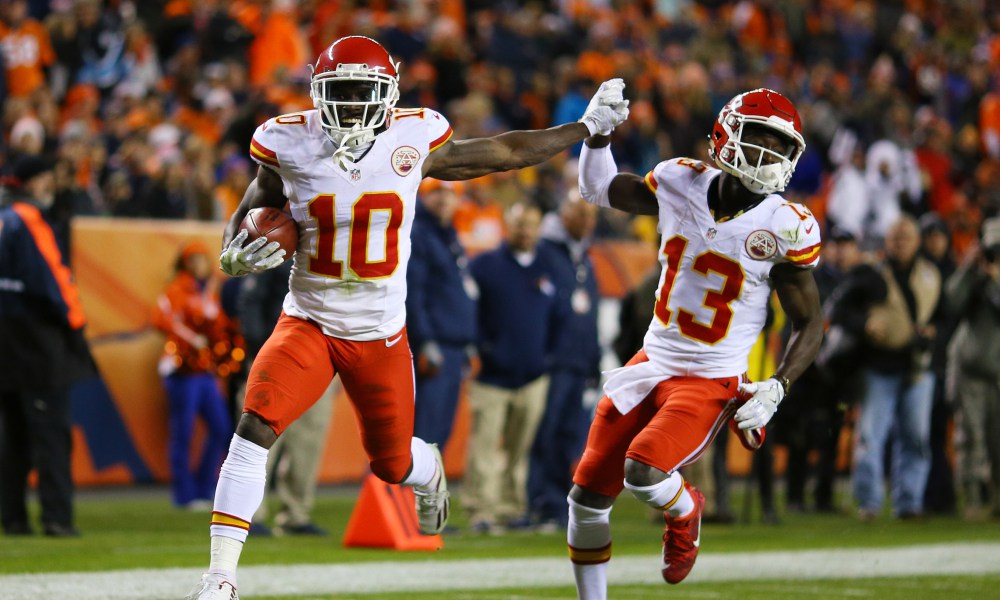 DENVER, CO - NOVEMBER 27: Wide receiver Tyreek Hill #10 of the Kansas City Chiefs celebrates with De'Anthony Thomas #13 after returning a kickoff for a touchdown in the second quarter of the game against the Denver Broncos at Sports Authority Field at Mile High on November 27, 2016 in Denver, Colorado. (Photo by Justin Edmonds/Getty Images) ORG XMIT: 663937769 ORIG FILE ID: 626200338
